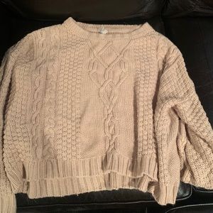 A cropped sweater
